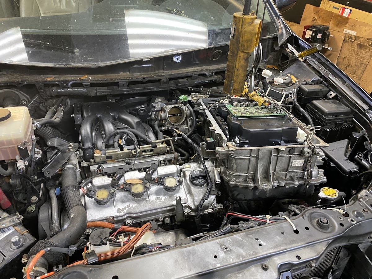Engine bay work in progress at Nai's Auto Repair in Decatur, GA